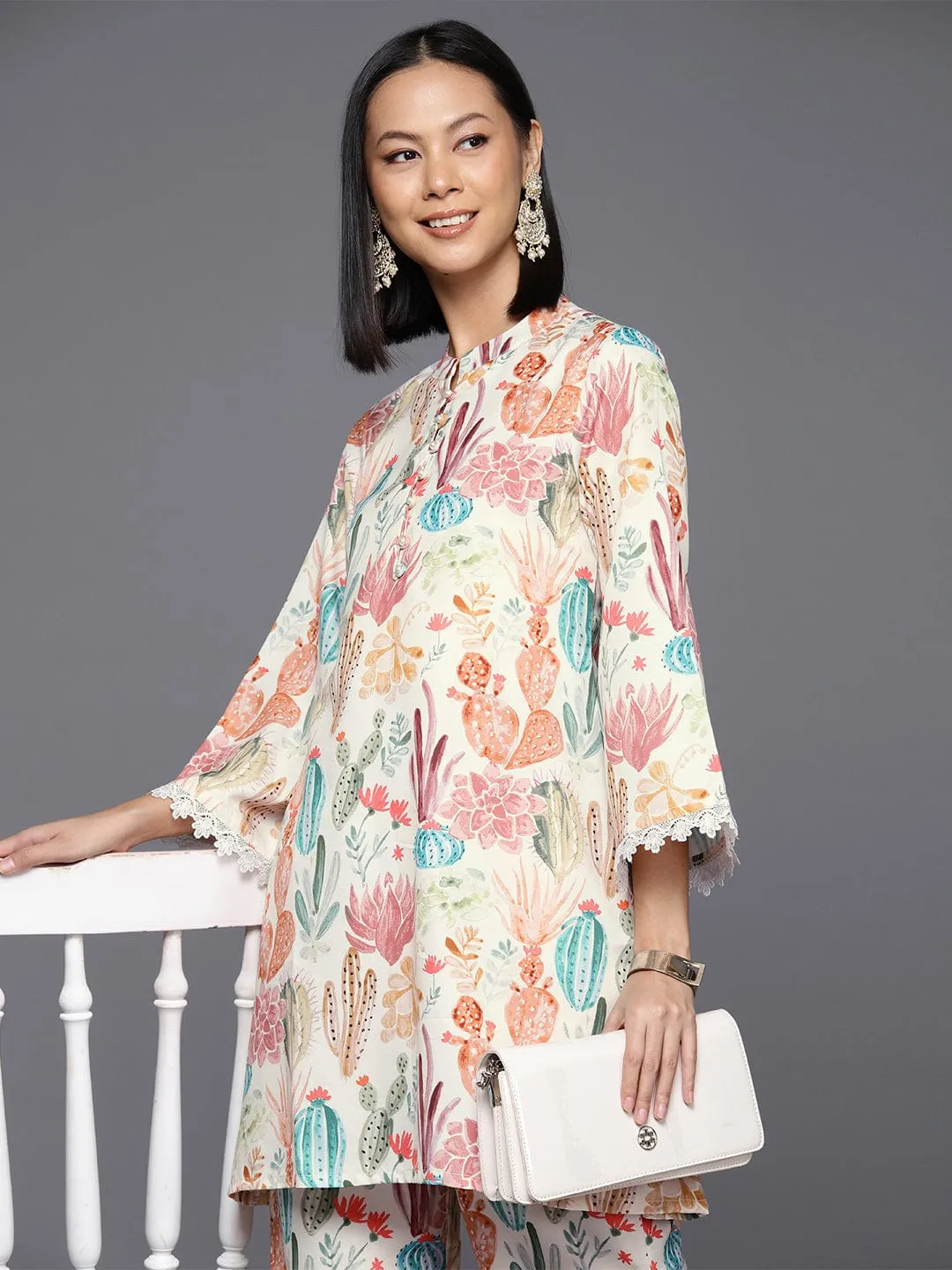 Varanga Women Cream Abstract Printed Tunic Paired With Tonal Bottom