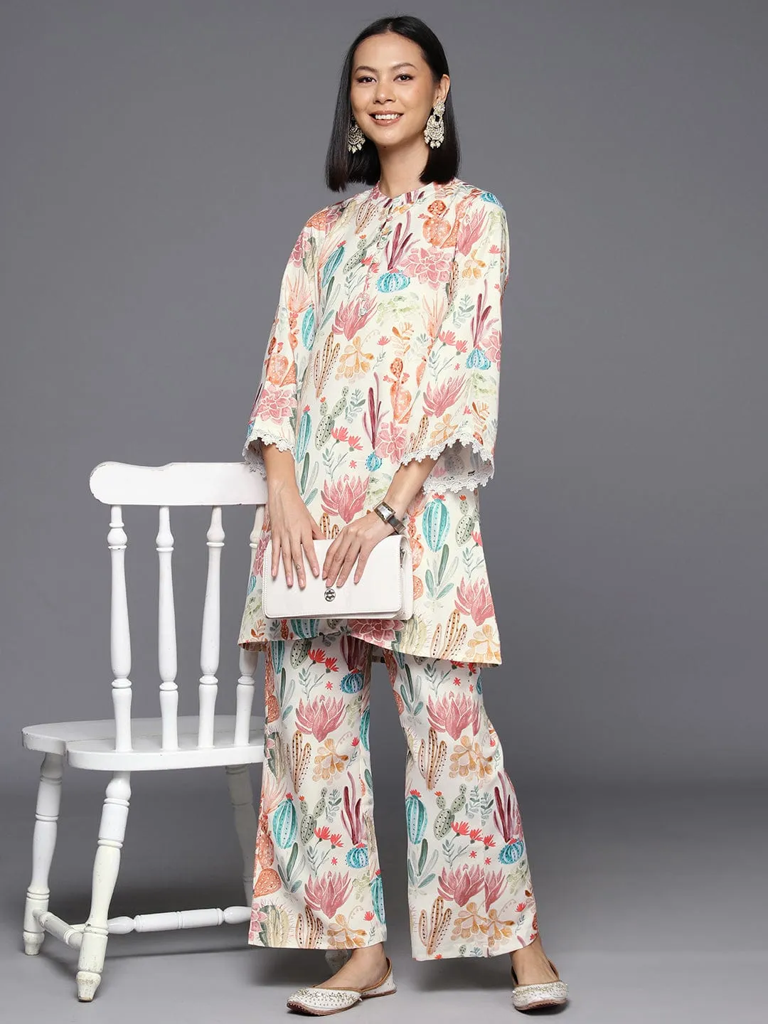 Varanga Women Cream Abstract Printed Tunic Paired With Tonal Bottom