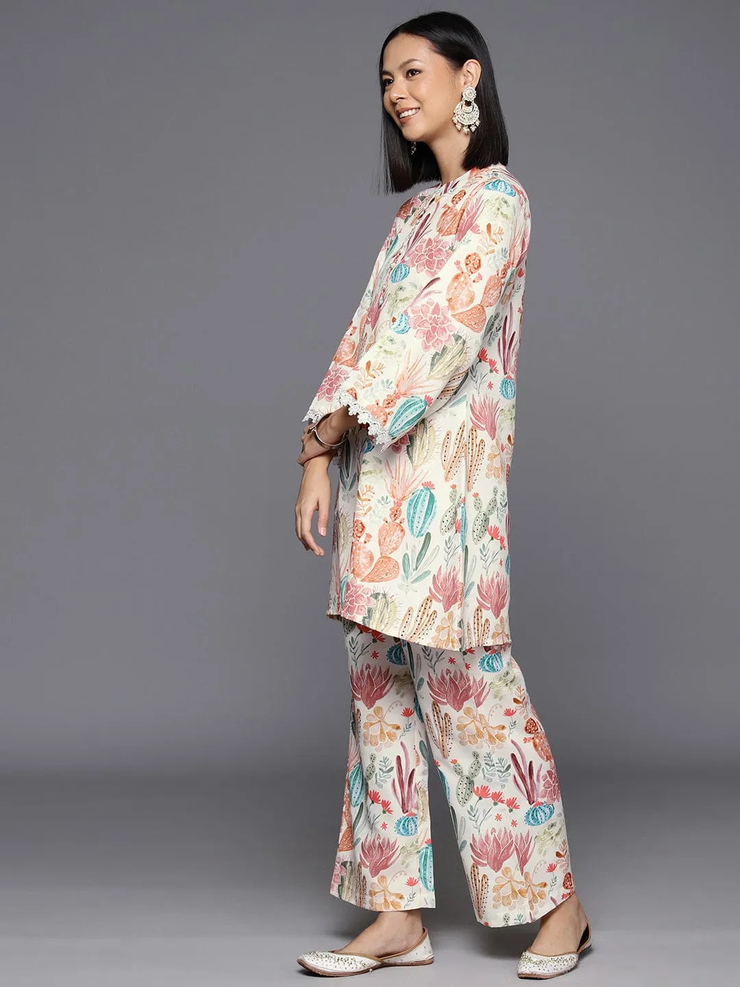 Varanga Women Cream Abstract Printed Tunic Paired With Tonal Bottom