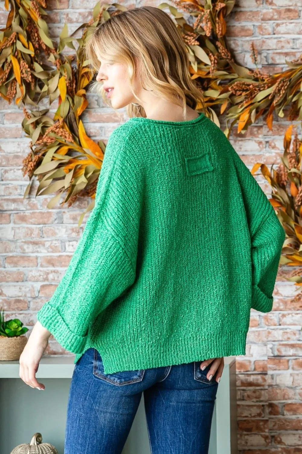 Veveret Notched Long Sleeve Sweater